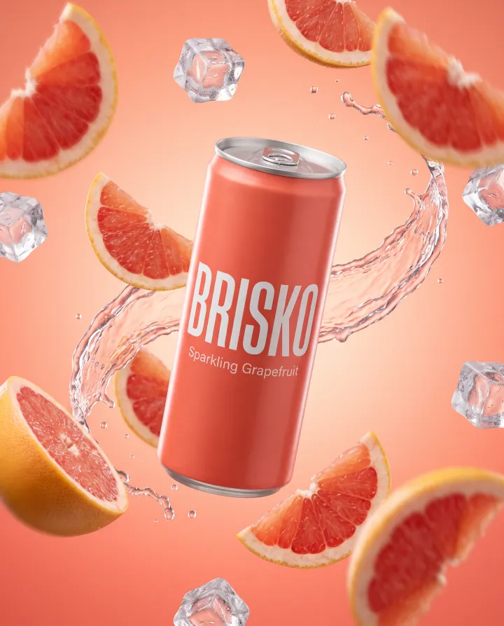 The BRISKO can floating with grapefruit and a splash